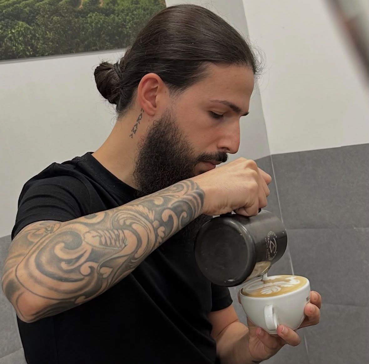 Giuseppe Ciccone serving espresso from the Lattèrie Caffè cart